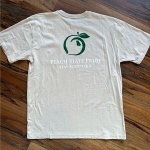 Peach State Pride Large Pocket Tshirt Cream with Dark Green Logo